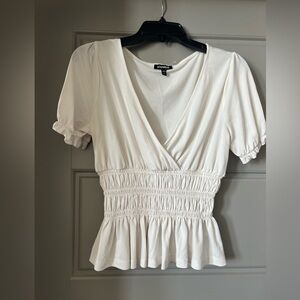 Ivory Express peplum top🤍